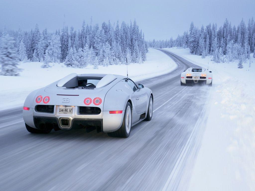 1024x768 Two white Bugatti Veyron on snowy road Desktop wallpaper 1024x768