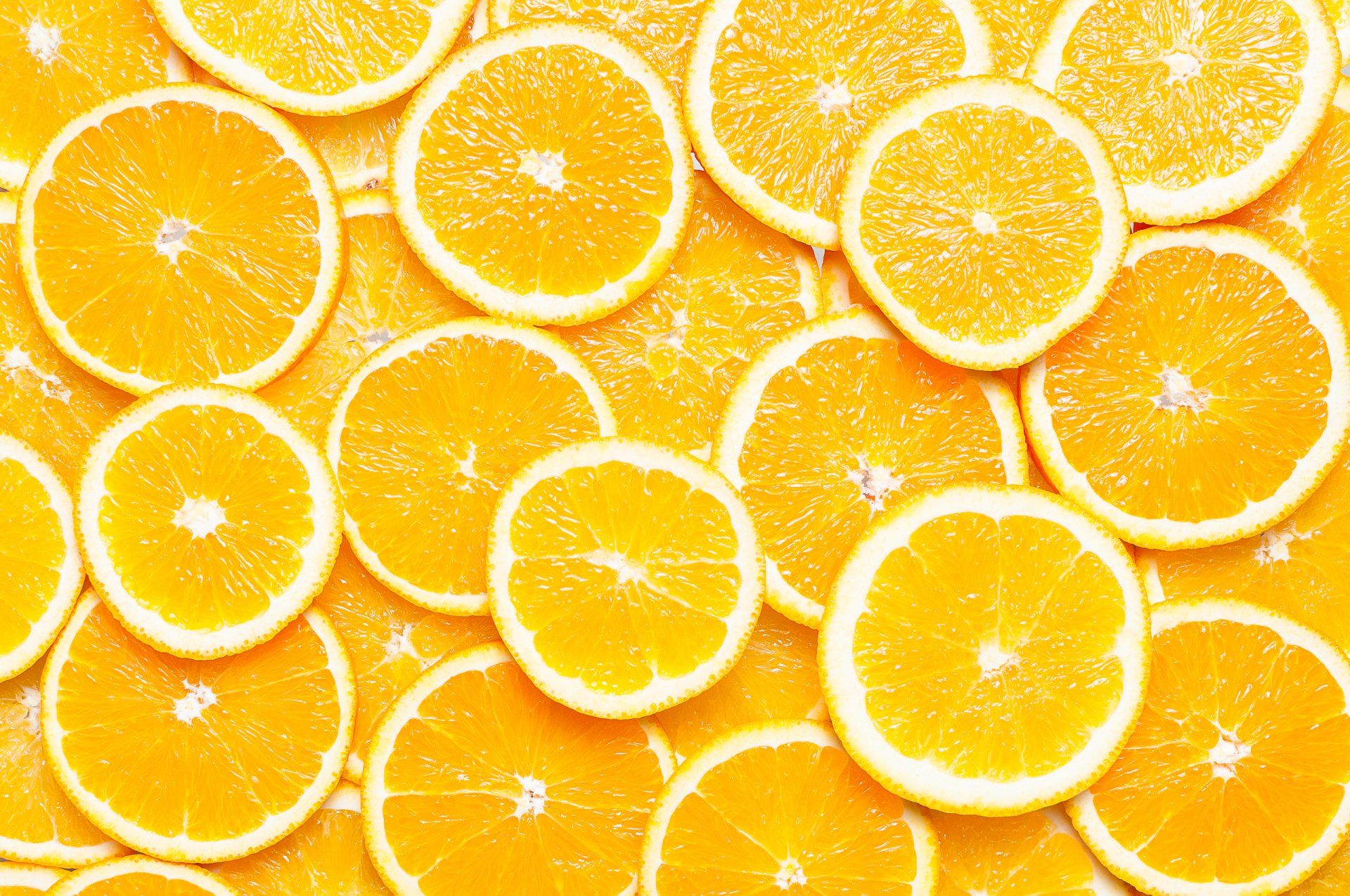 1920x1275 Vibrant Citrus Glow: Fresh Orange Slices HD Wallpaperx1700