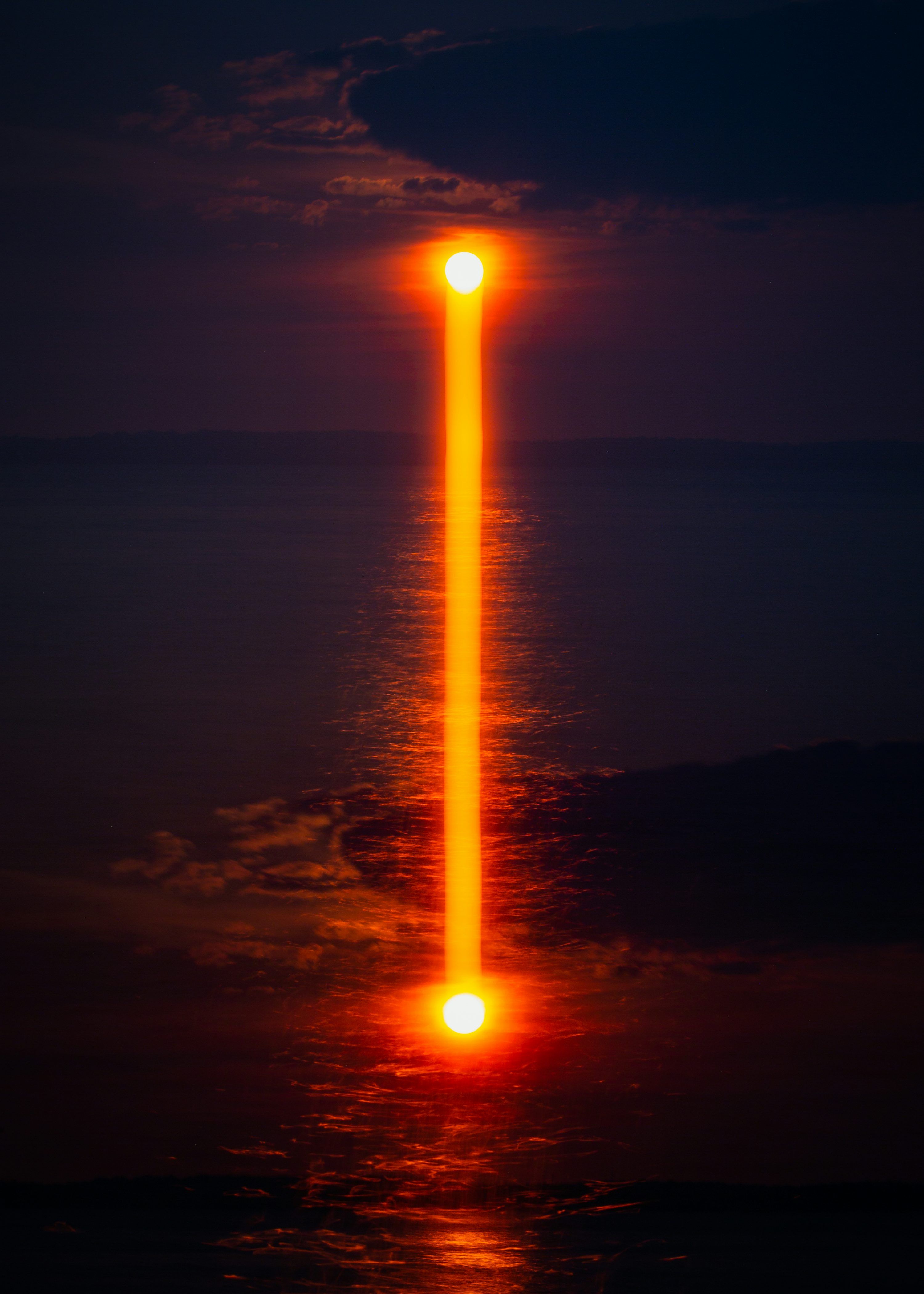 3000x4200 Orange reflection of light on sea from moon at night time photo