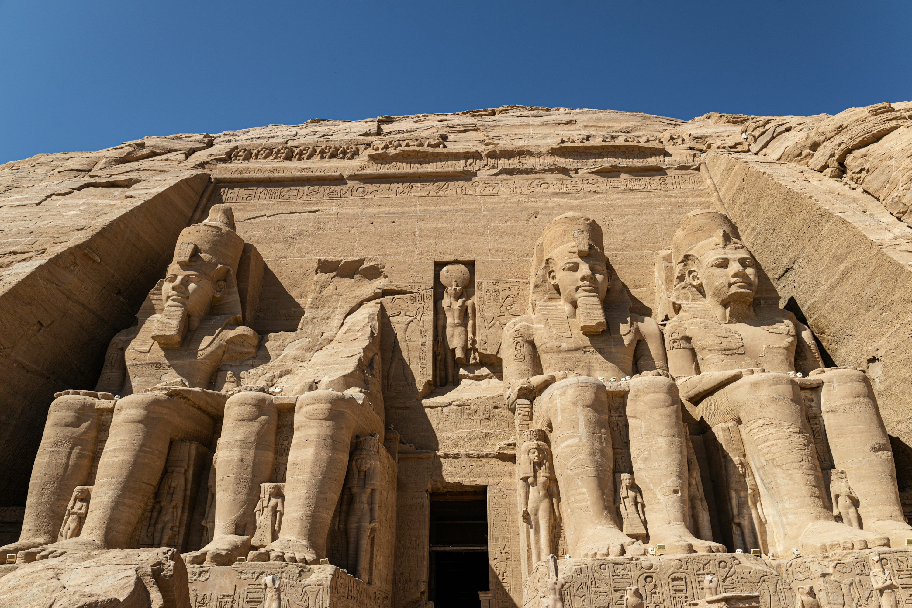 3000x2000 A group of statues in front of a building photo