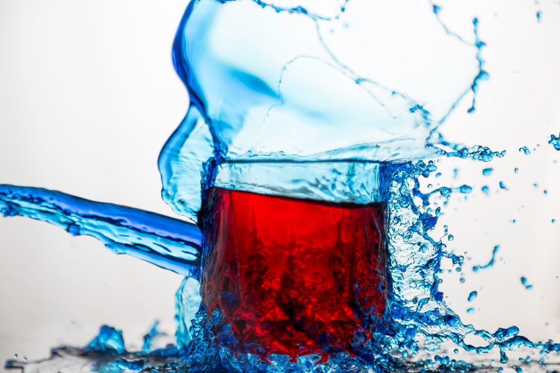 1125x750 Blue Clear Glass Cup Splashed of Water · Free