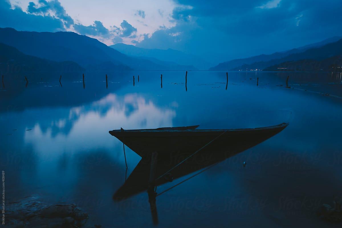 1200x799 Boat tied to a pole in Fewa lake, Pokhara, Nepal.