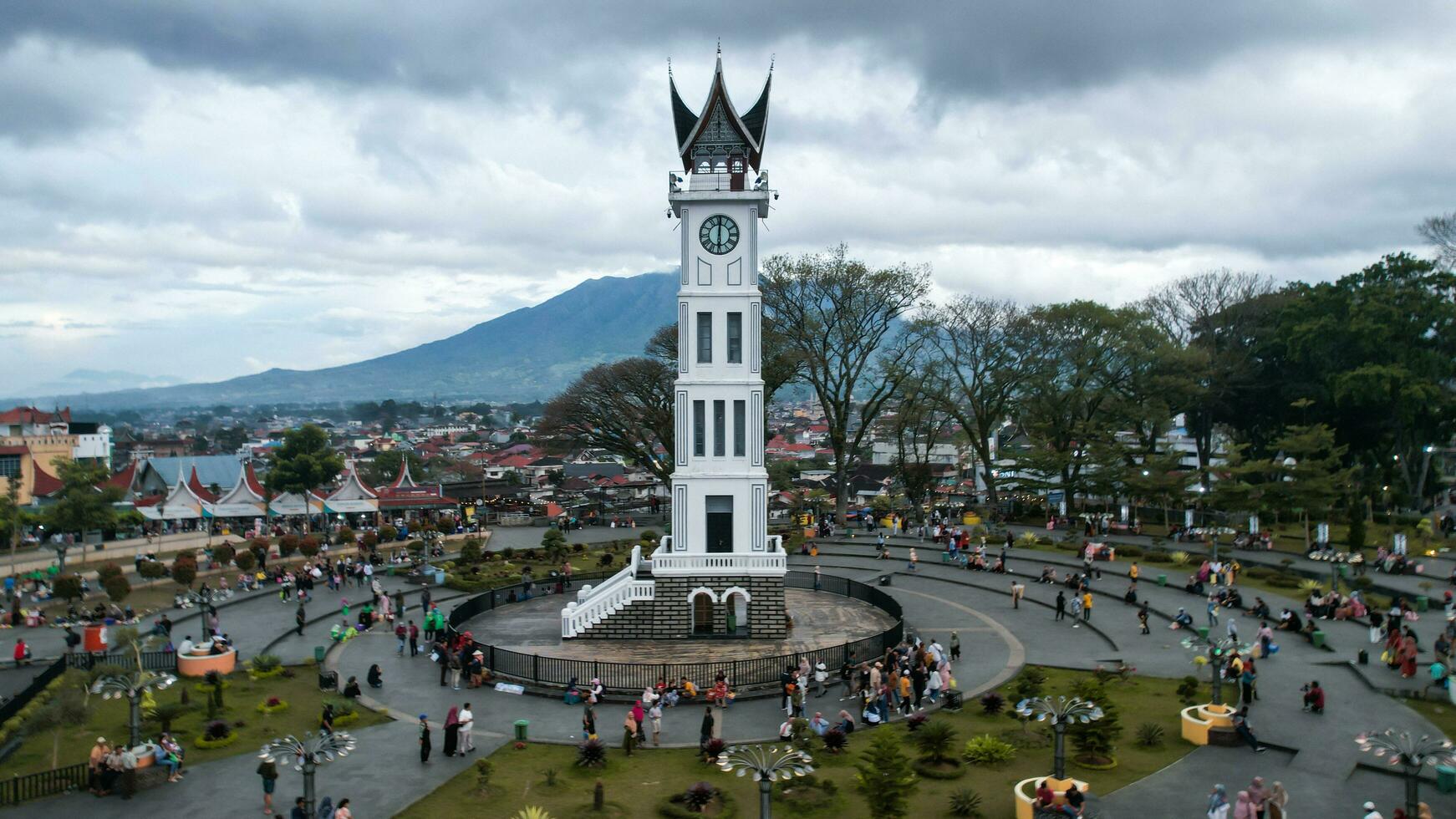 1742x980 Aerial view of Jam Gadang, a historical and most famous landmark in BukitTinggi City, an icon of the city and the most visited tourist destination by tourists. Bukittinggi, Indonesia, January 2023