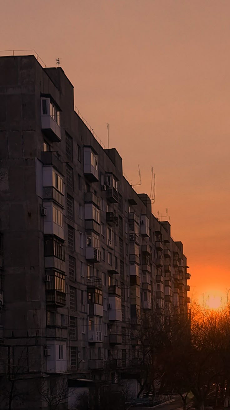 736x1313 City Aesthetic: Stunning Sunset Behind an Apartment Building. Soviet aesthetic wallpaper, Tall apartment building