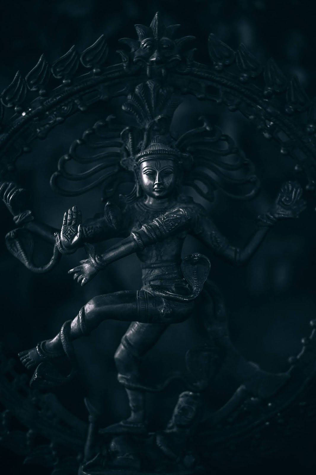 1066x1600 Download Majestic Four Armed Black Shiva Statue Wallpaper
