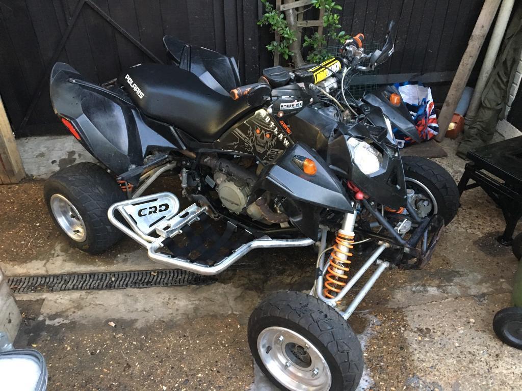 1024x768 Polaris outlaw Ktm 525 quad bike on road 2007. in Queenborough