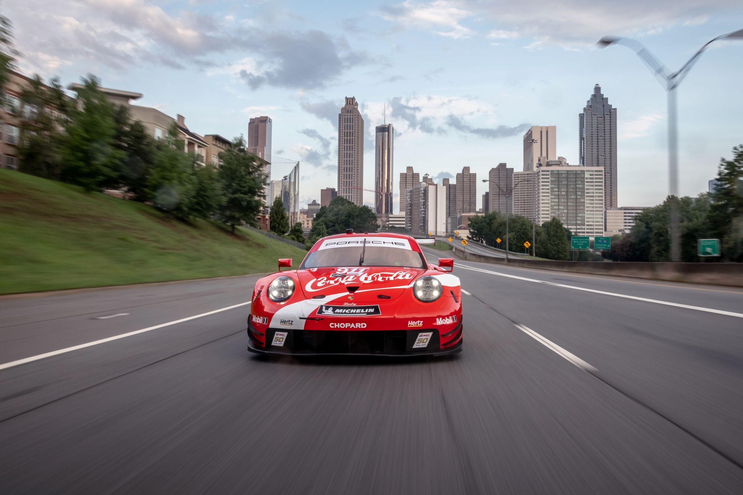 2597x1731 View Photo of Porsche's 911 RSR in Coke Livery