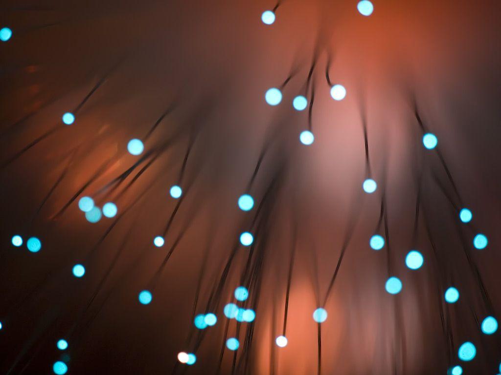 1024x768 Gold Lights Background For PowerPoint and Textures PPT Templates