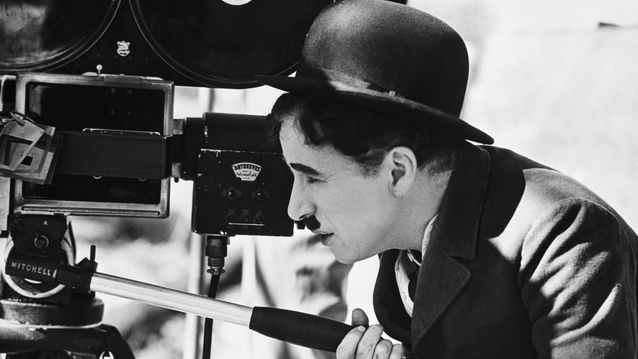 2048x1152 charlie chaplin, camera, bowler hat 2048x1152 Resolution Wallpaper, HD Man 4K Wallpaper, Image, Photo and Background