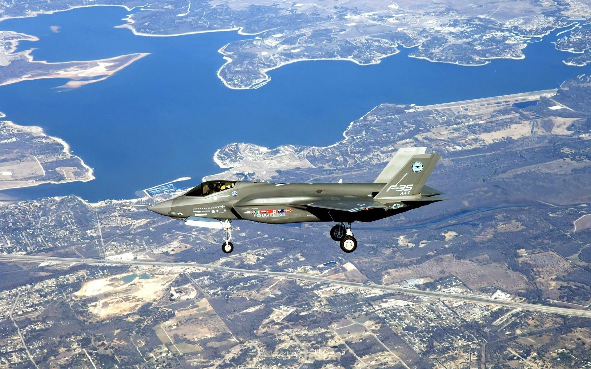 1920x1200 Airplane F 35 Lightning II Over The City Wallpaper And Image, Picture, Photo