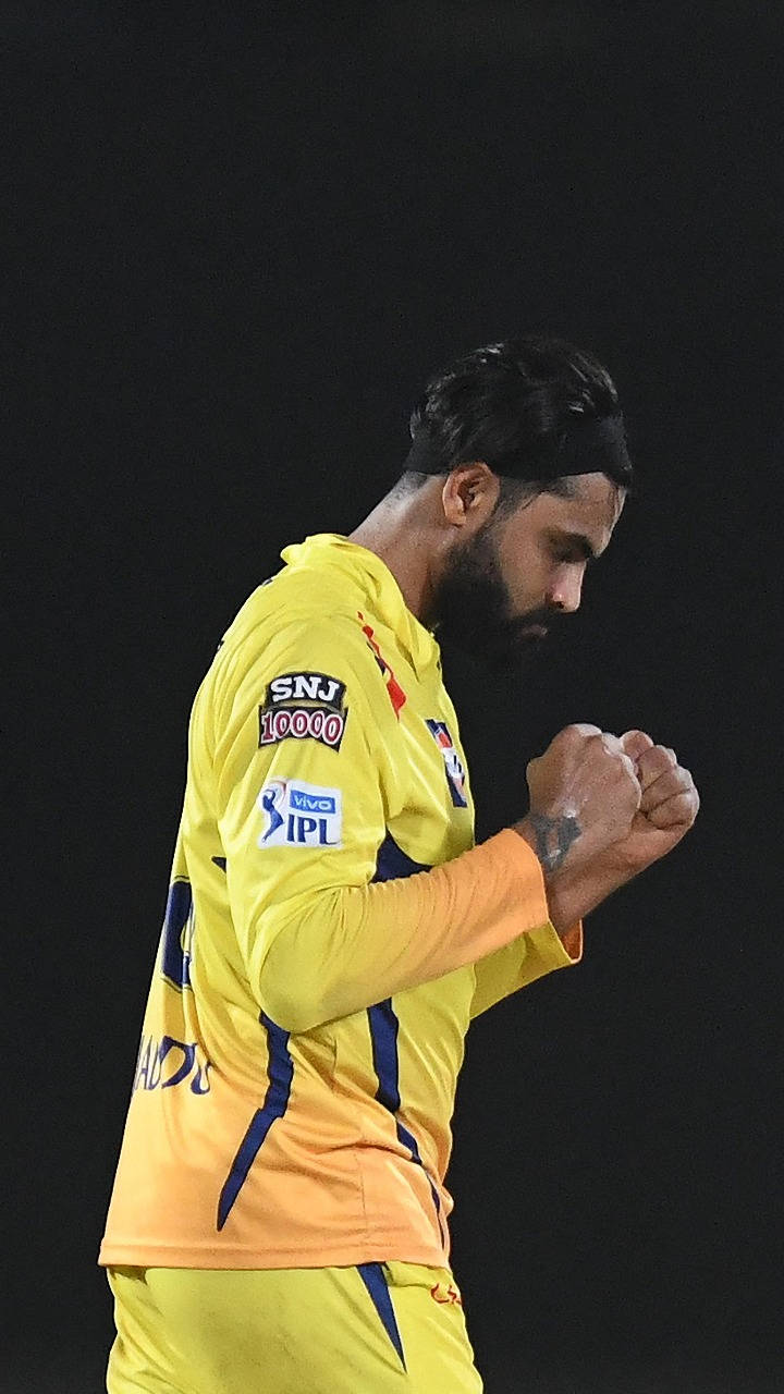 720x1280 Download Ravindra Jadeja posing in his Chennai Super Kings attire Wallpaper