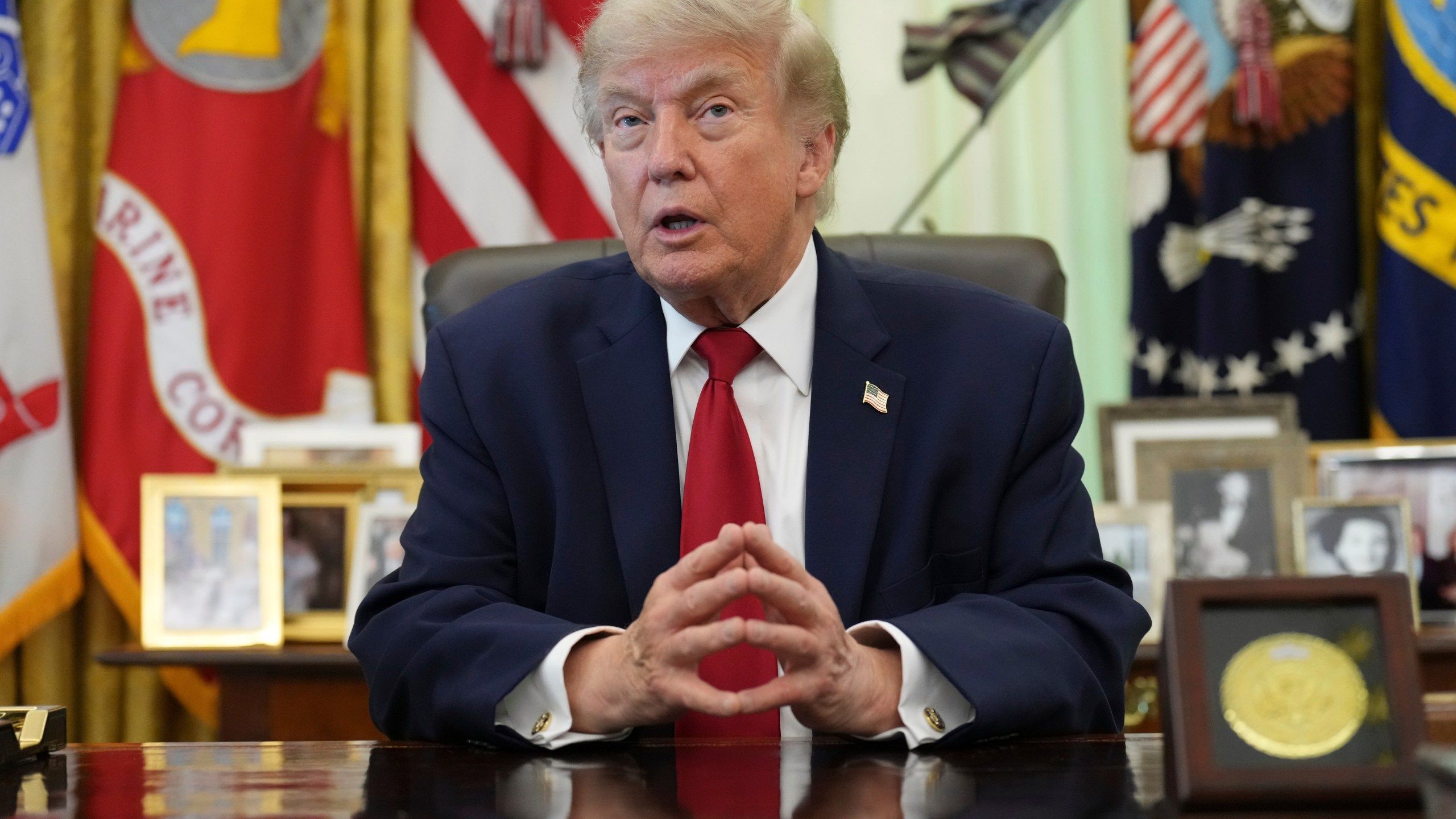 2560x1440 The Latest: Federal filing shows Trump took in about $1.2 billion from crypto businesses last year