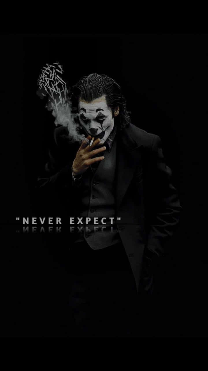 720x1280 Download Intriguing Joker Quote on a Dark, Artistic Background Wallpaper