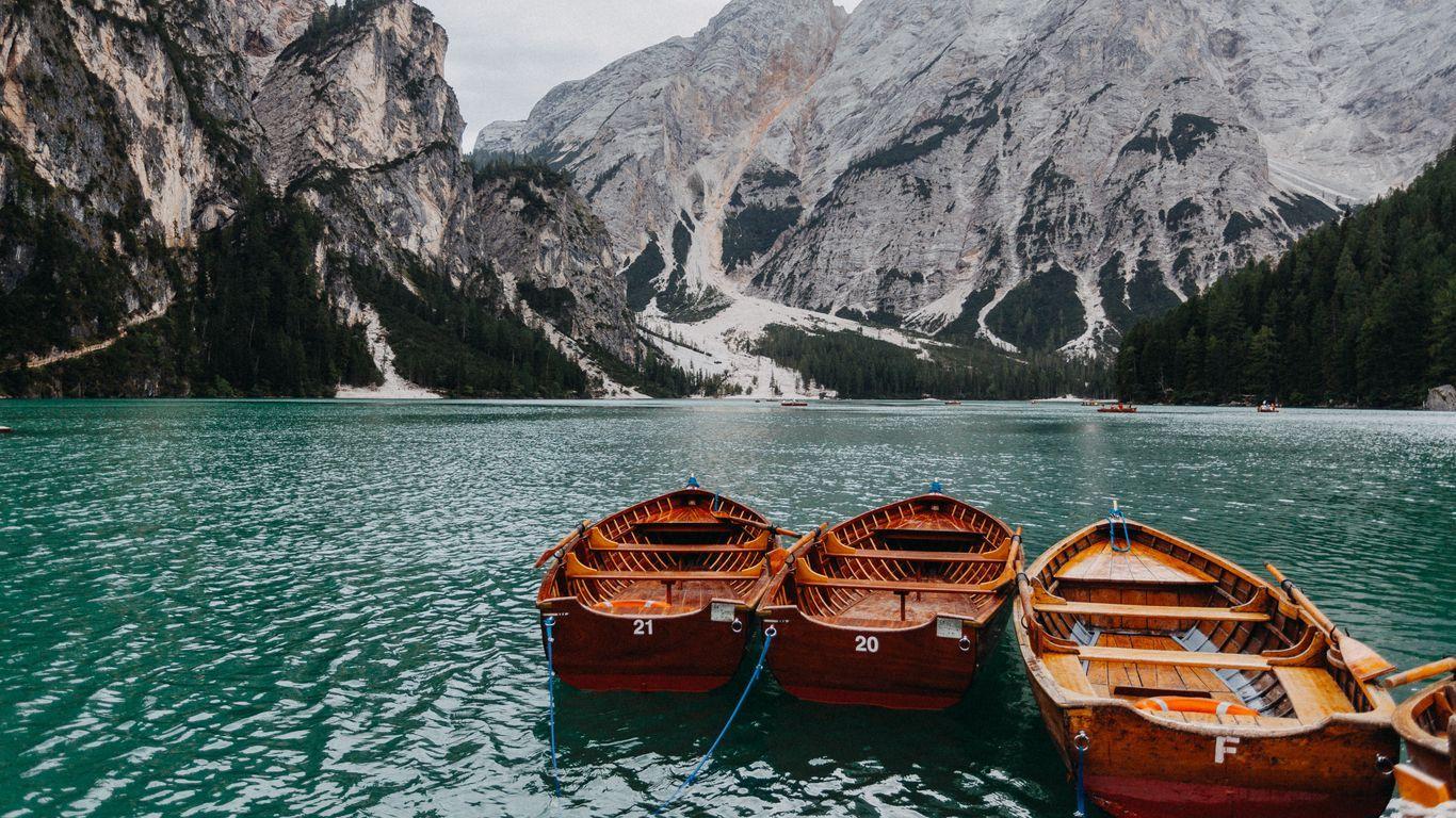 1366x768 Download wallpaper 1366x768 boats, mountains, lake tablet, laptop HD background