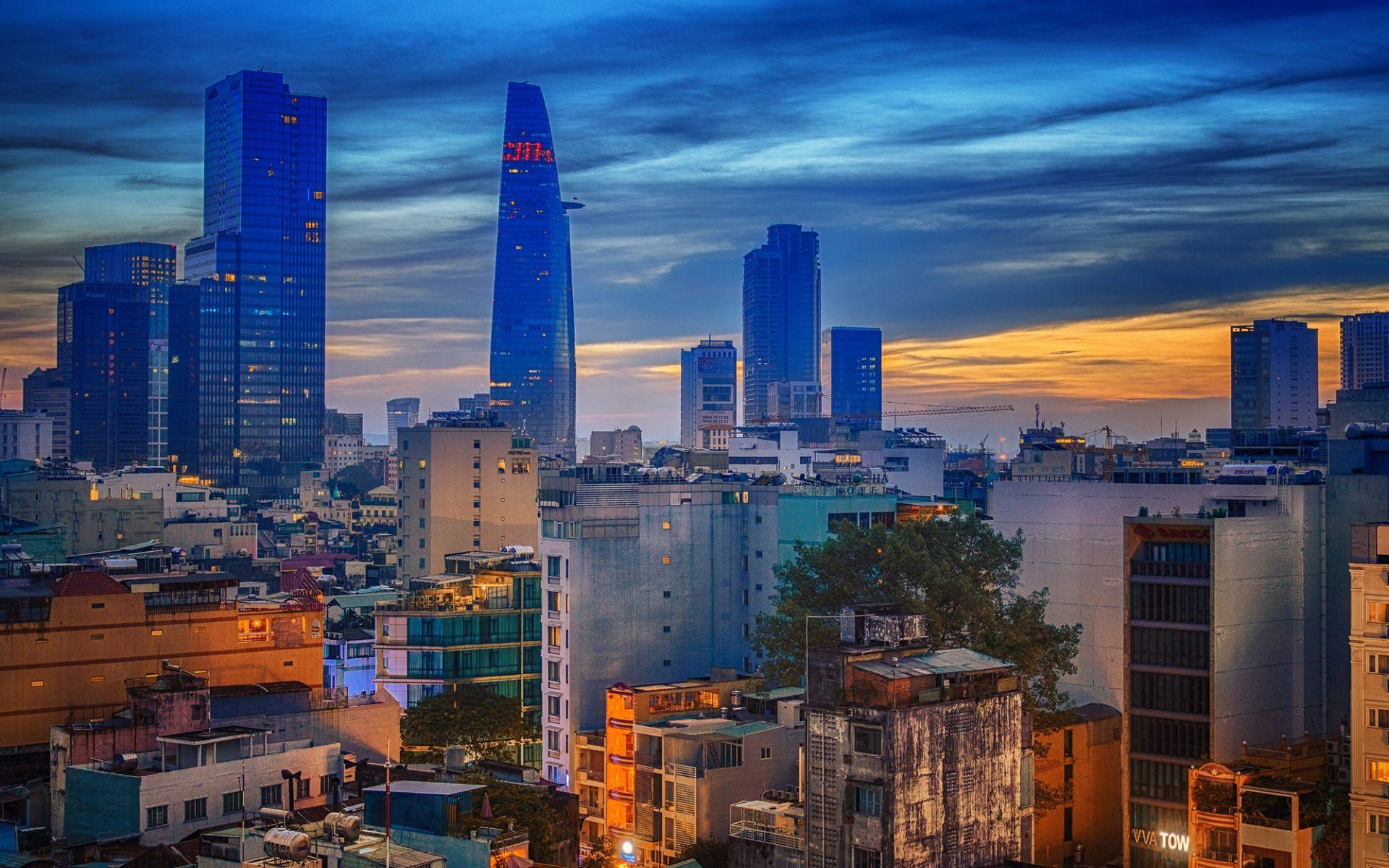 1920x1200 Download wallpaper Saigon, Ho Chi Minh City, Vietnam, evening, sunset, skyscrapers, business centers, city lights for desktop with resolution 1920x1200. High Quality HD picture wallpaper