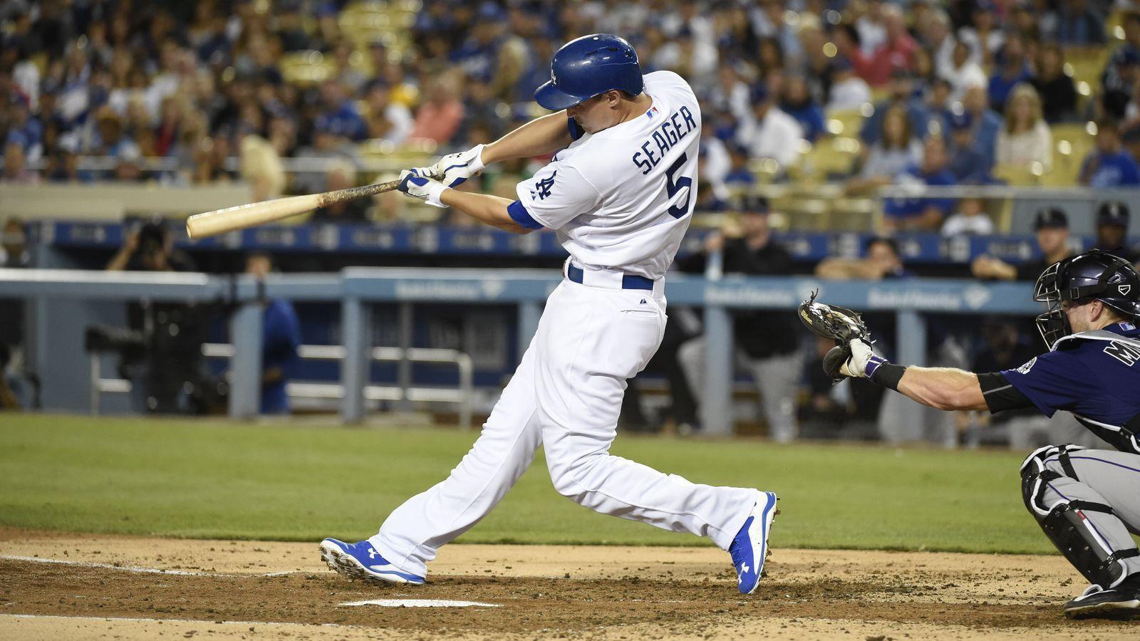 Download Corey Seager Surrounded By Smoke Wallpaper