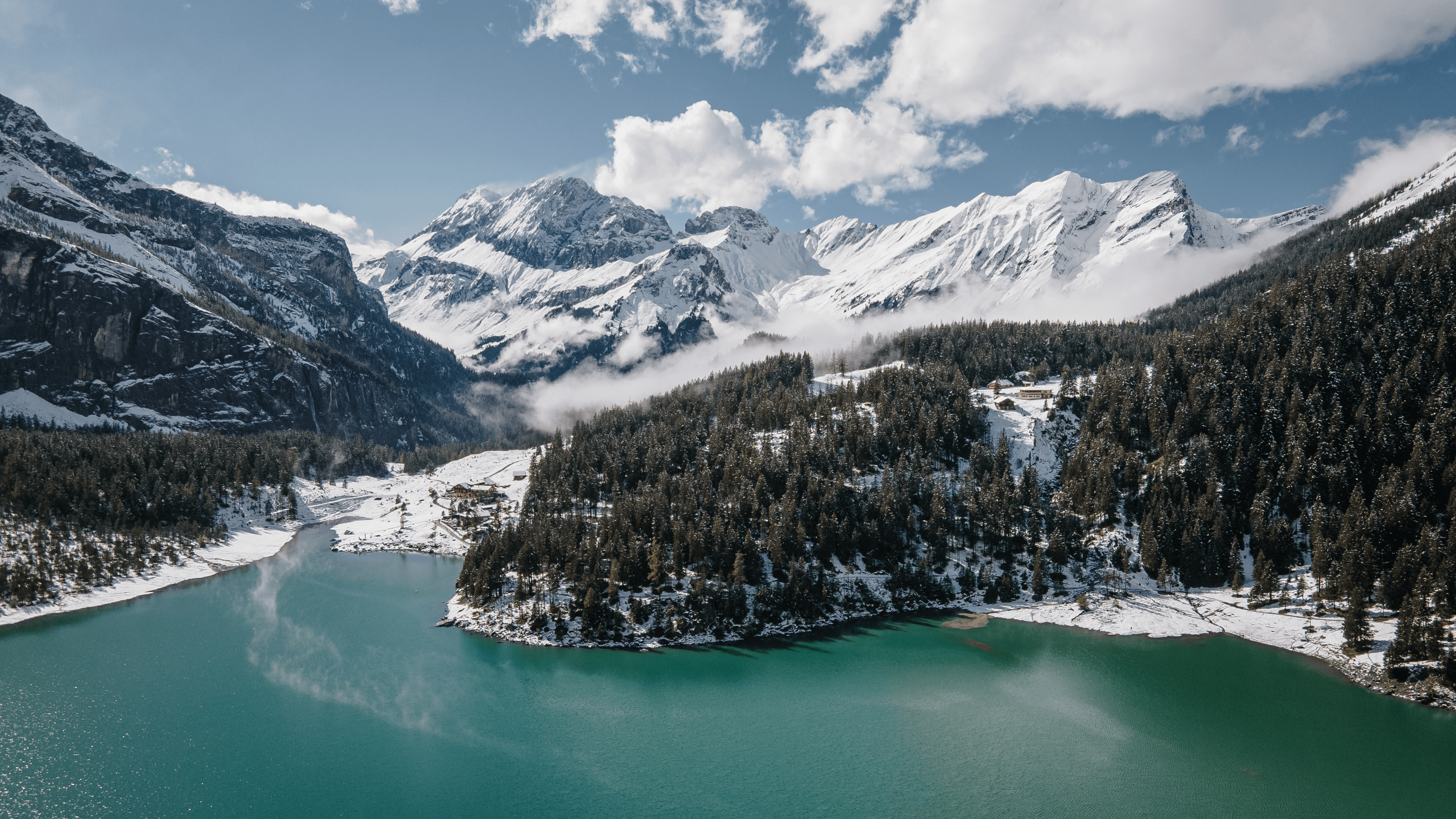 3806x2141 First snow covering Oeschinen lake in Switzerland. This lake is actually unreal and very easy to access :)
