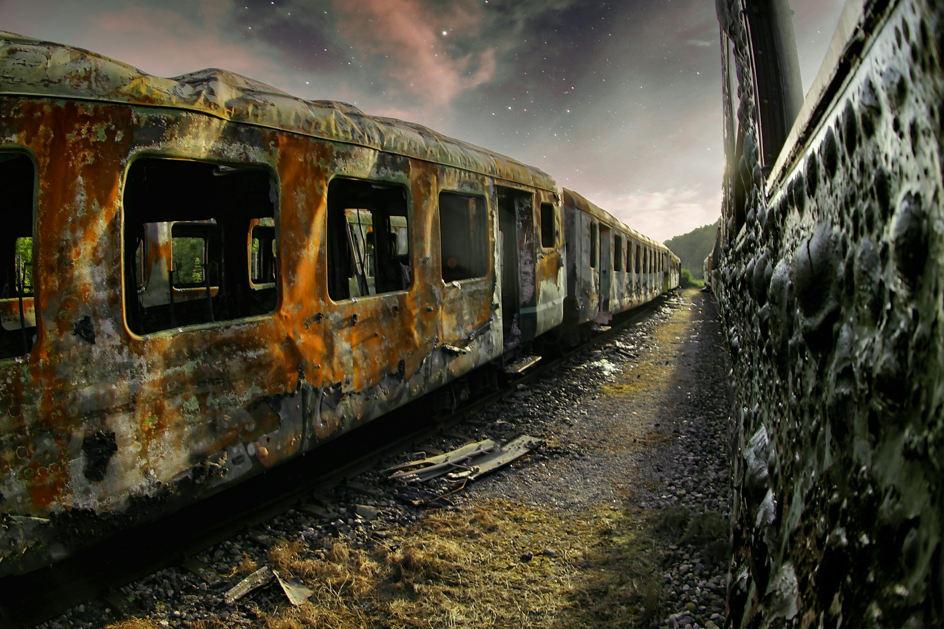 3000x2000 An old rusty train sitting on the tracks photo