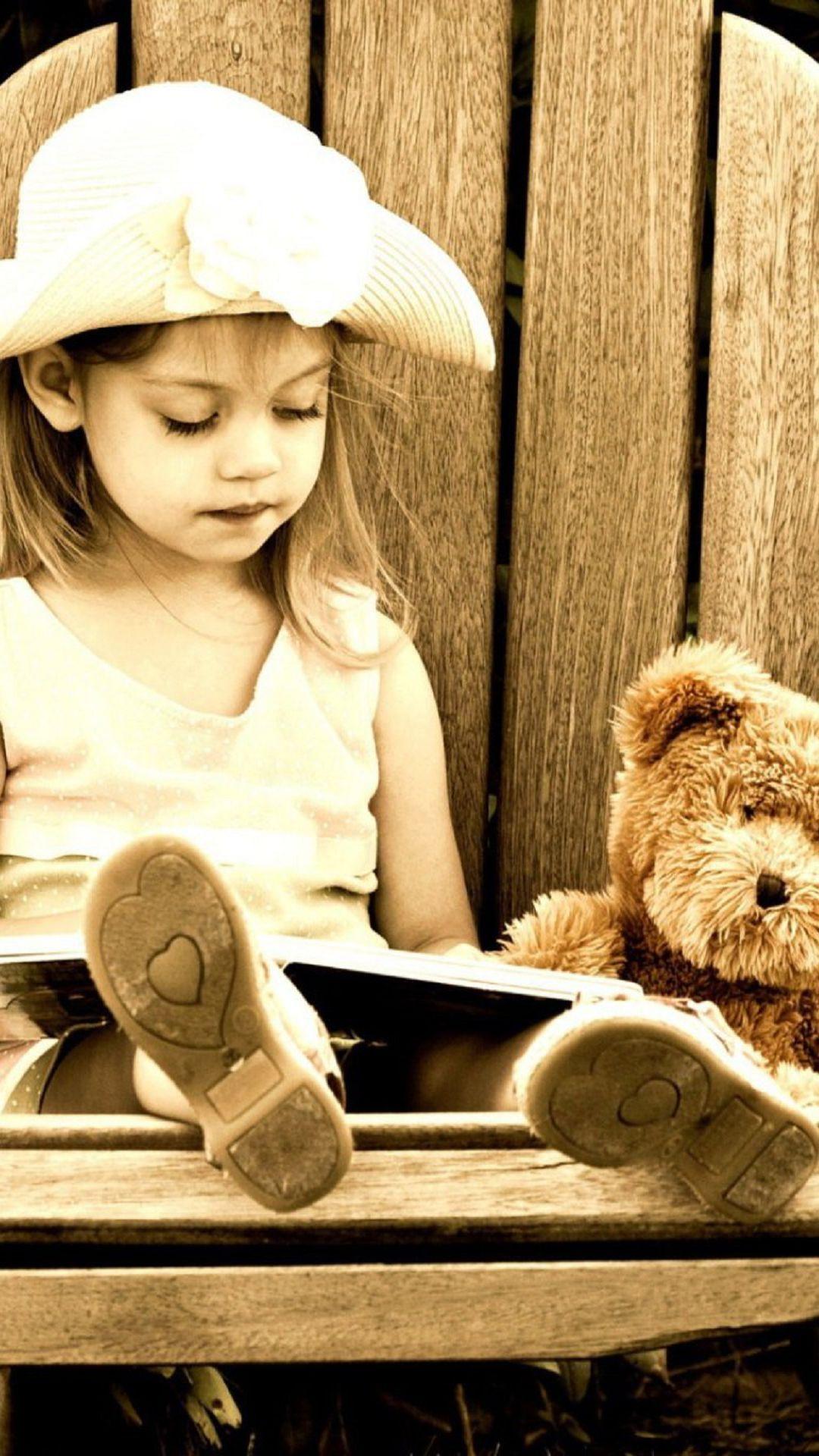 1080x1920 Young Girl Reading A Book Teddy Bear Android Wallpaper free download