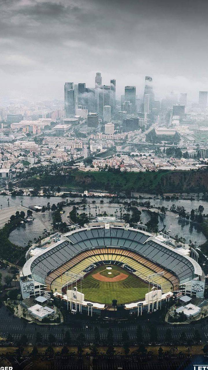 Dodgers Stadium with DTLA in background  Dodger stadium, Stadium wallpaper,  Sunset pictures