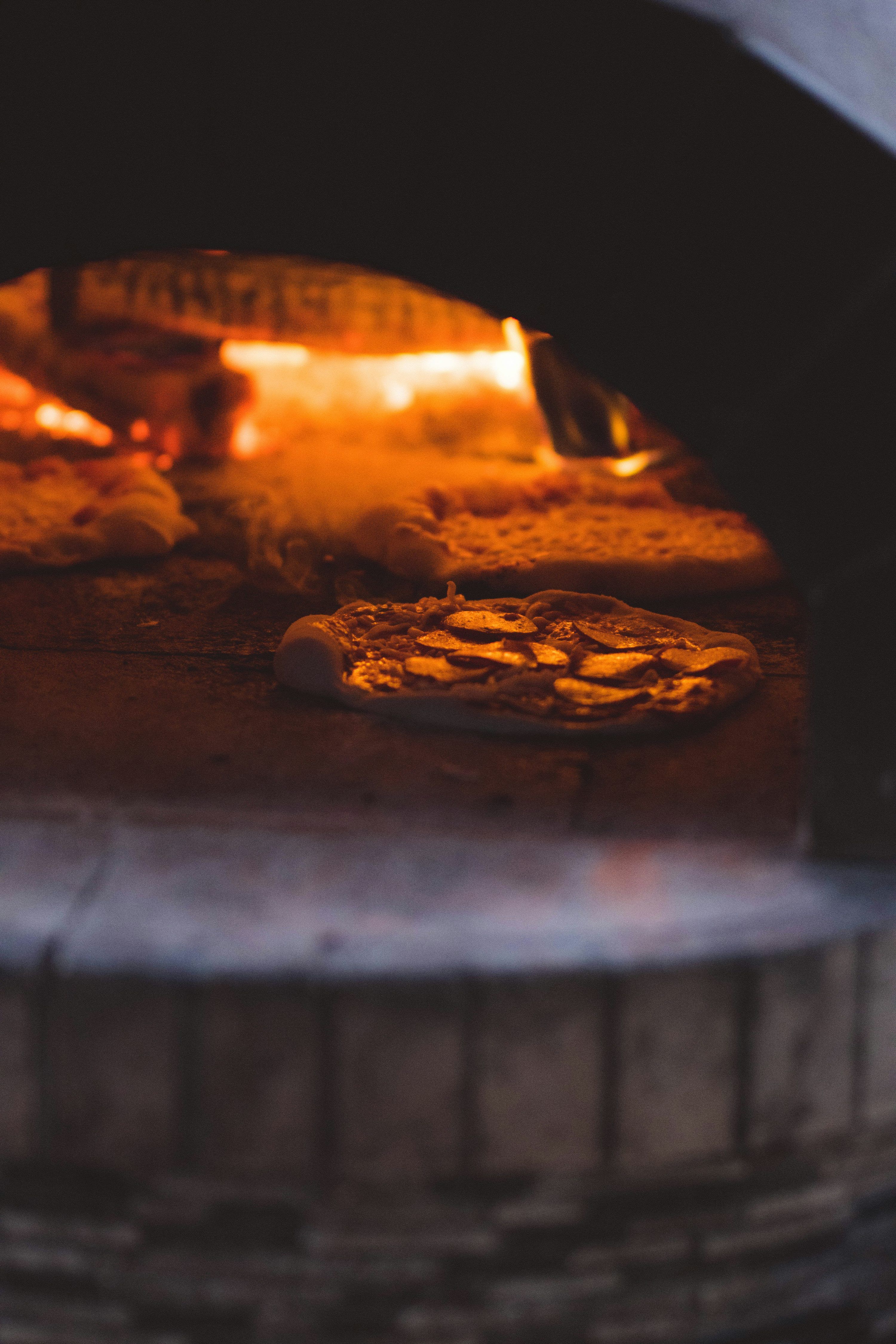 3000x4500 Pizza Baking In A Wood Fired Oven. Photo