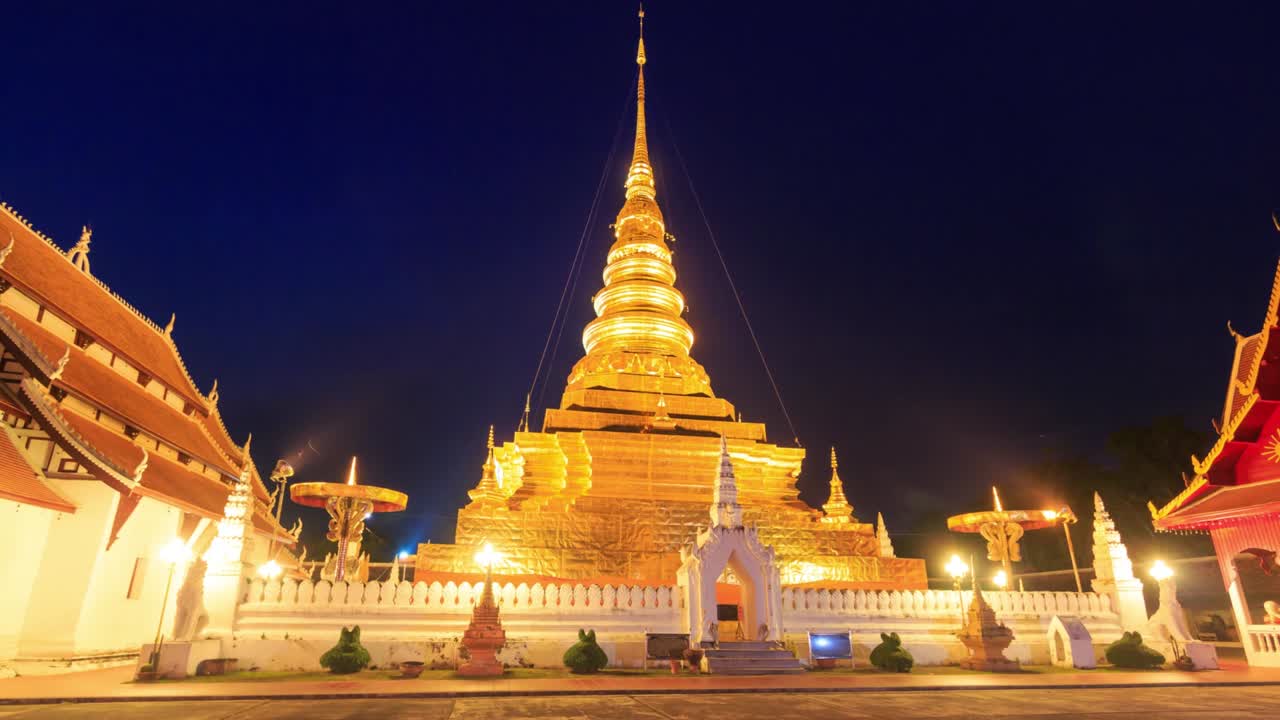 1280x720 Aerial view of beautiful gloden pagoda at sunset. phra pathom chedi temple in nakhon pathom province, thailand