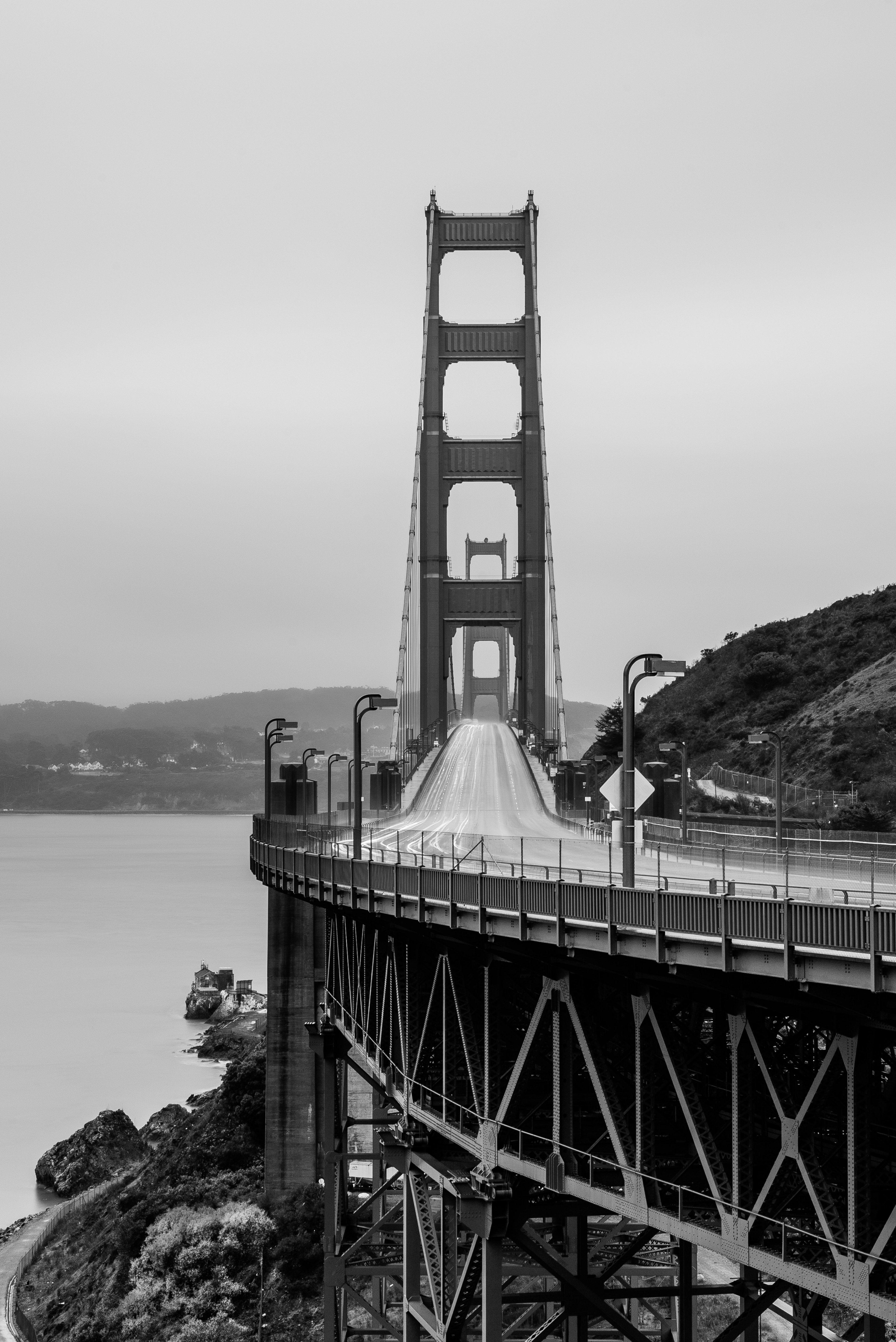 3840x5749 Wallpaper / footprints in the sand with the golden gate bridge in the background in san francisco, since 1933 4k wallpaper
