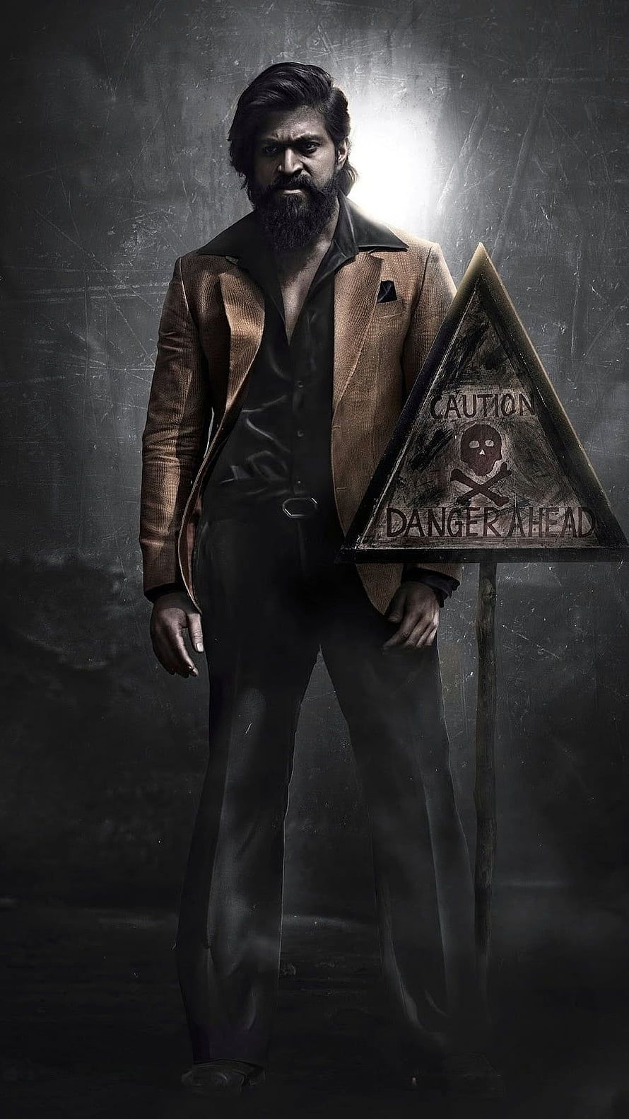 890x1582 2732x2048px, 2K Free download. Allu Arjun as Pushpa Raj in a brown suit standing next to a danger sign HD phone wallpaper