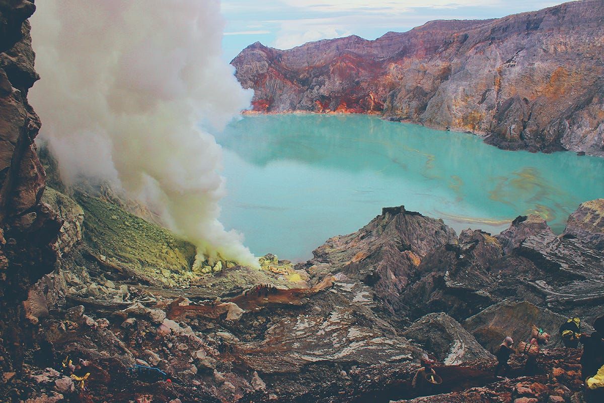 1200x800 Kawah Ijen Photography Guide. Billowing white smoke spirals out of a. by PIXEO. Travel Photography Guides