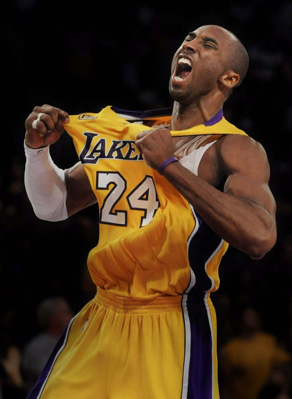 1002x1368 Jersey Wallpaper Kobe Bryant Download Kobe Bryant Basketball Showing Off Lakers Jersey