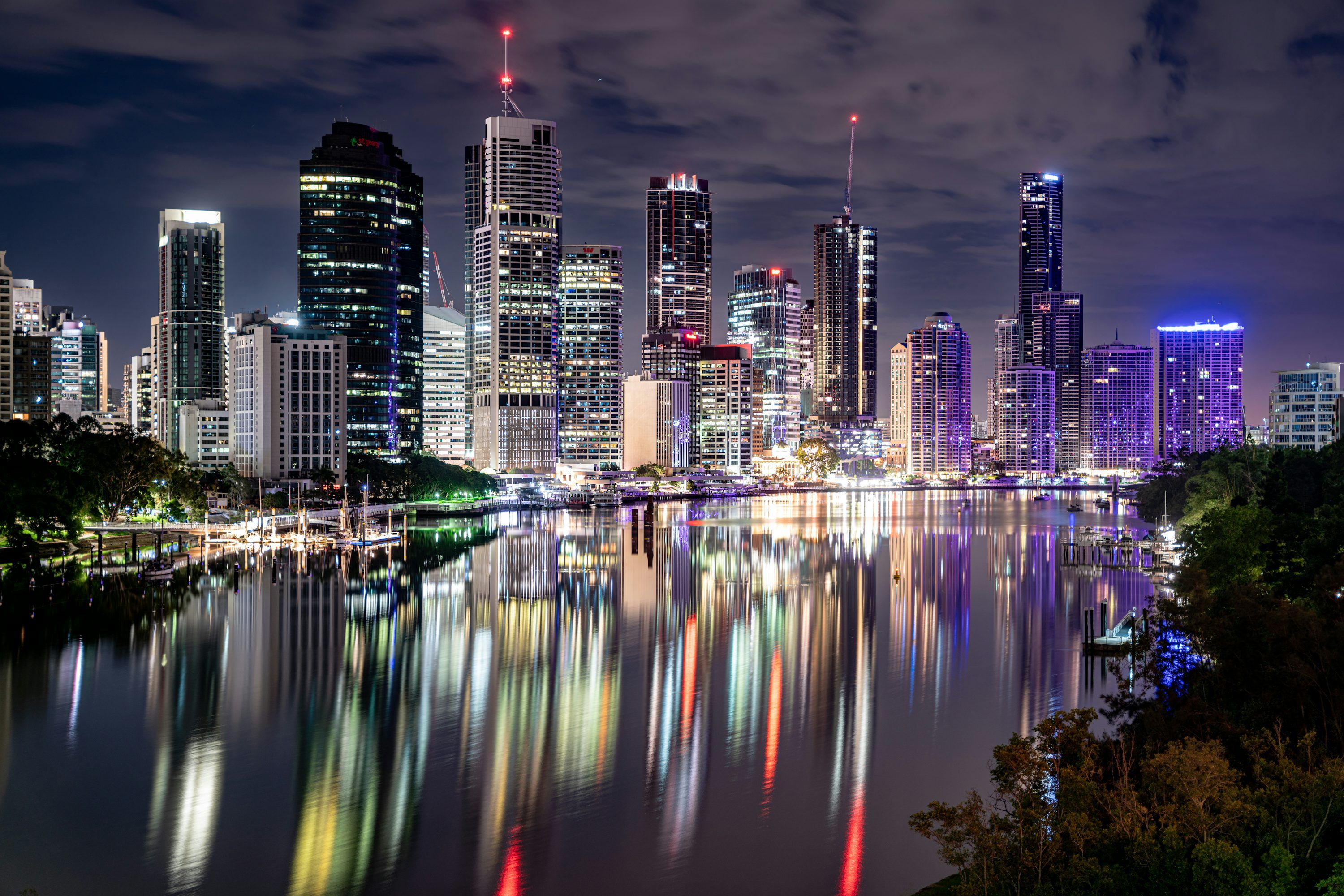 3000x2000 A view of a city at night photo