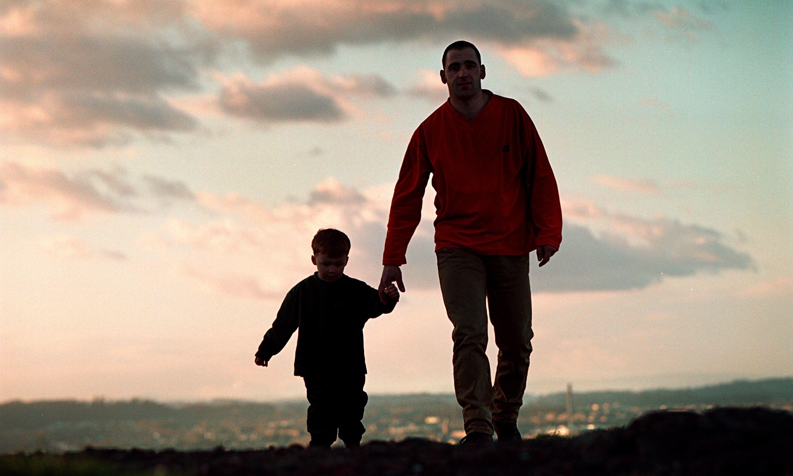 2560x1536 Father Holding Son S Hand HD Wallpaper