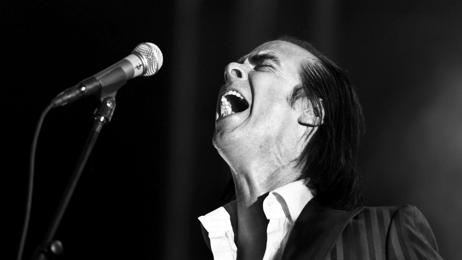 1920x1080 Download Wallpaper 1920x1080 nick cave, show, microphone, face, teeth Full HD 1080p HD Background