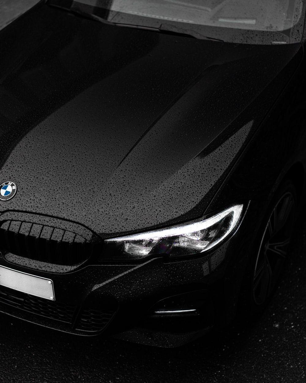 1000x1250 black bmw car in close up photography photo