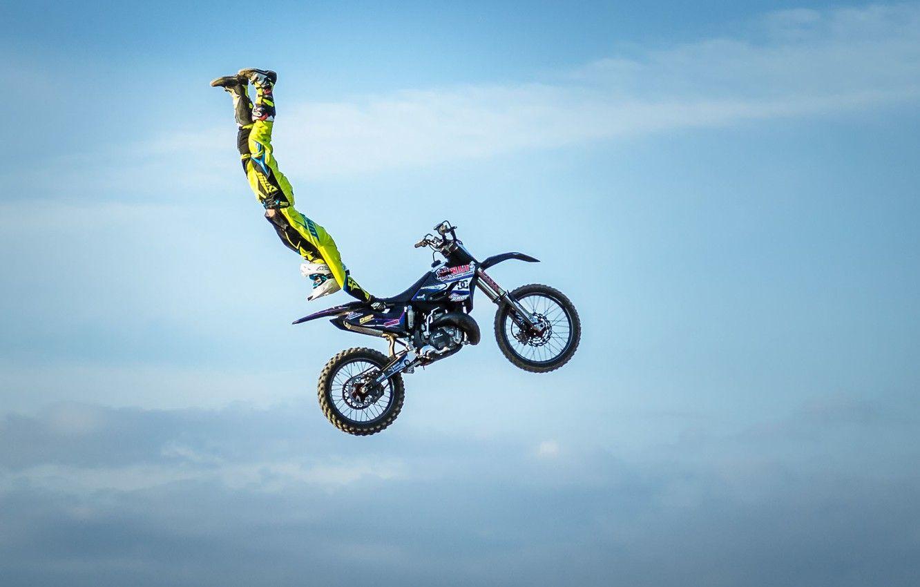 1332x850 Wallpaper maneuver, rider, motocross, freestyle, sky, clouds, FMX, extreme sports, Superman Double Seat Grab image for desktop, section спорт