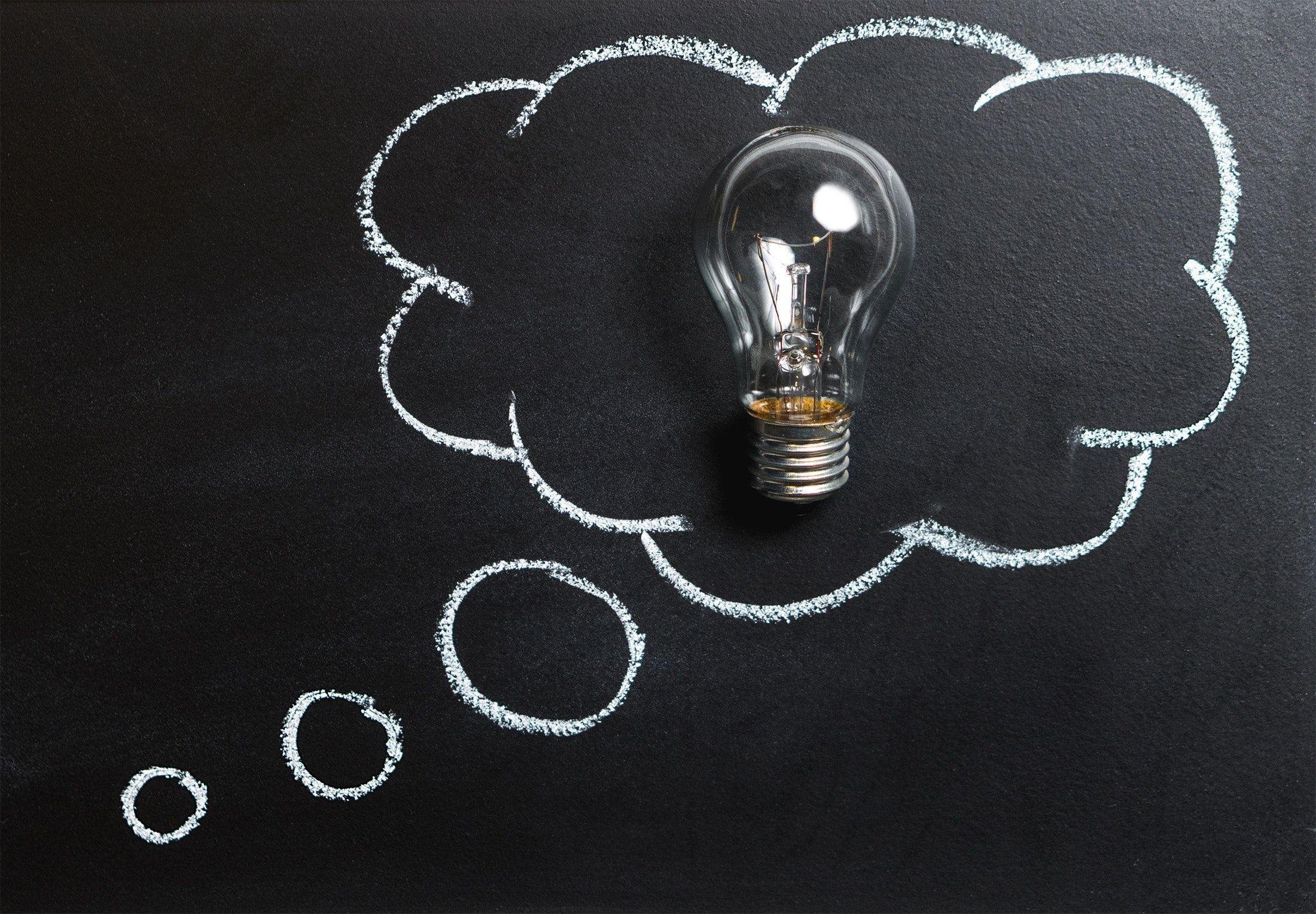 2200x1529 Clear Light Bulb Placed on Chalkboard · Free