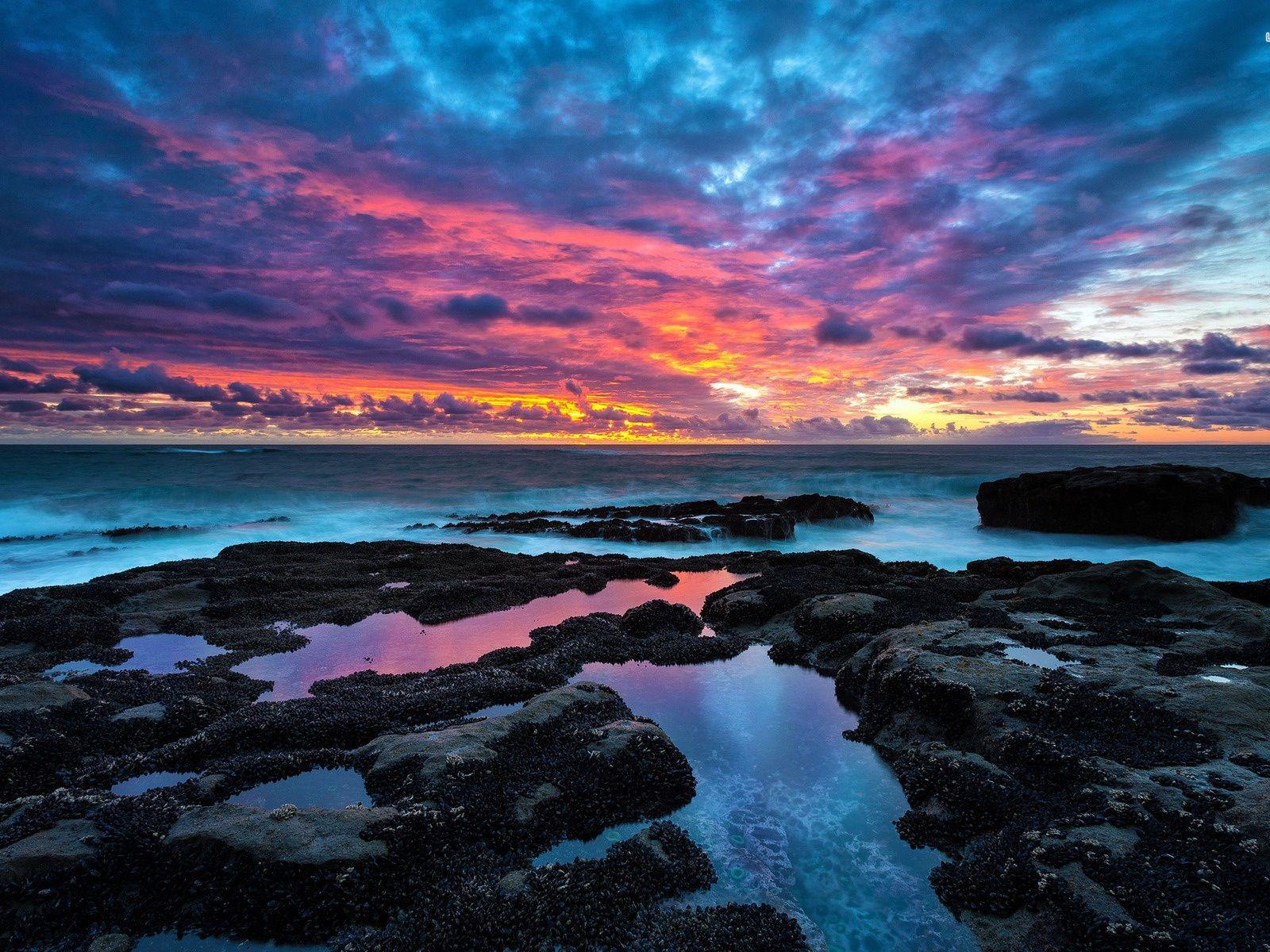 1600x1200 Ocean Black Rocks & Pink Sky desktop PC and Mac wallpaper
