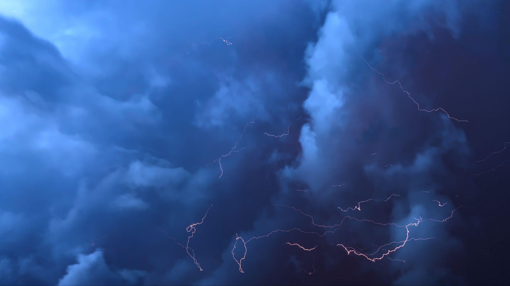 2048x1152 Download wallpaper 2048x1152 lightning, thunderstorm, clouds, overcast ultrawide monitor HD background