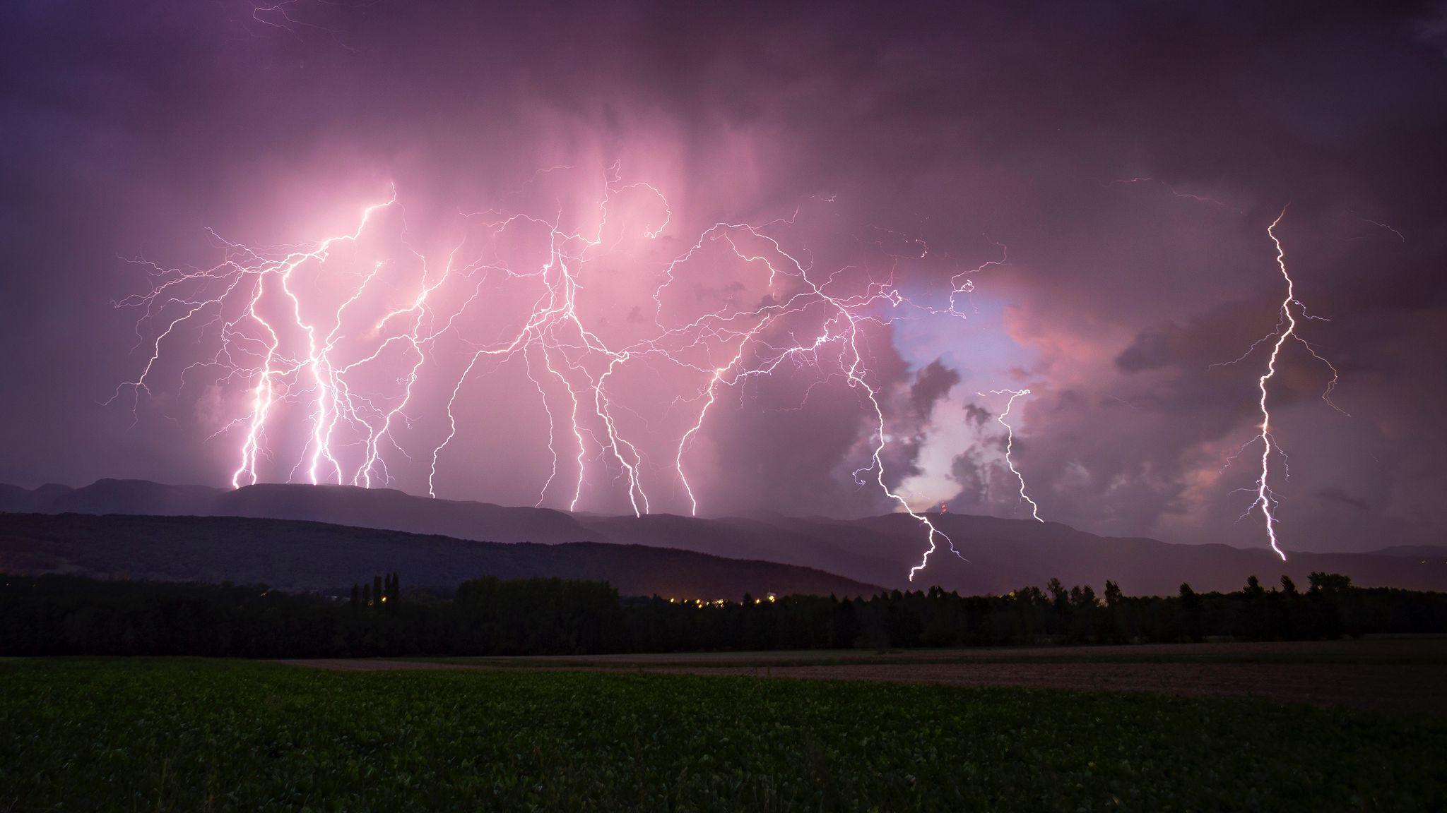 2048x1152 Download wallpaper 2048x1152 lightning, thunderstorm, overcast, night, sky, horizon ultrawide monitor HD background