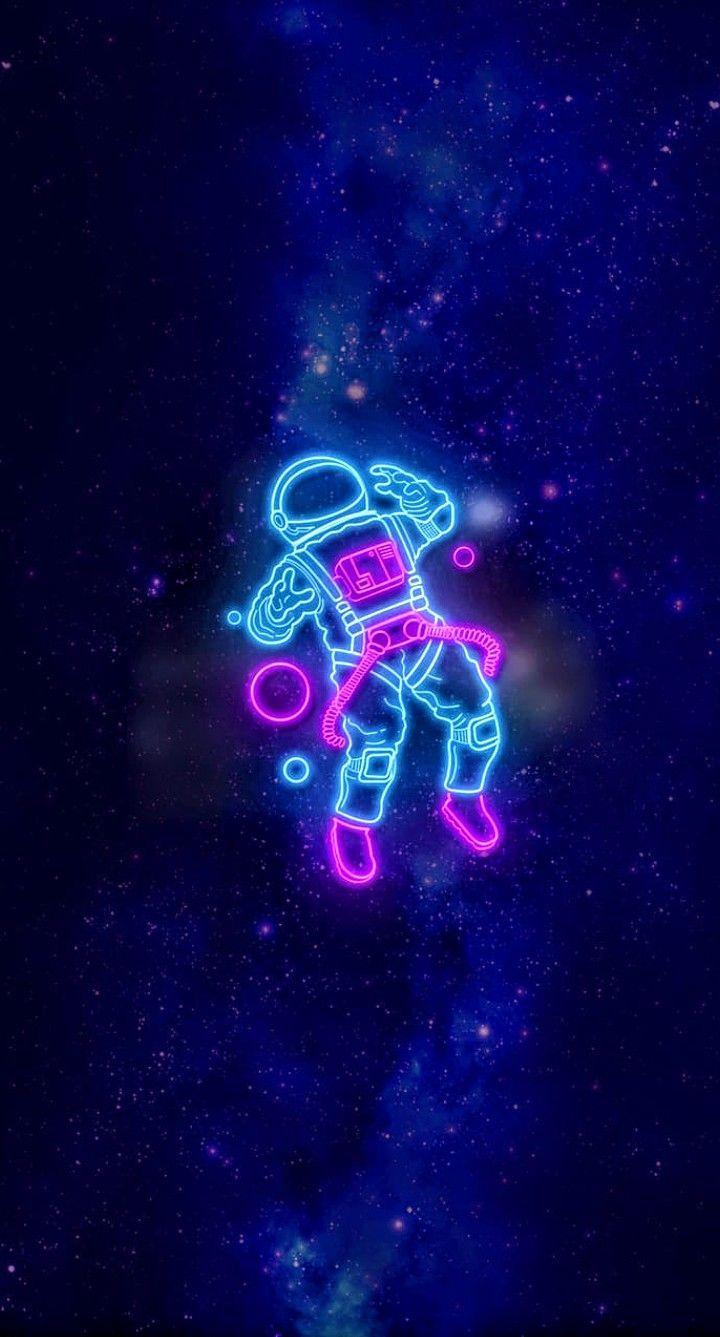 Portrait of a neon astronaut from the future An astronaut posing in an  astronaut costume and space helmet in the middle of multicolored smoke  Perfect for phone wallpaper or for posters Stock