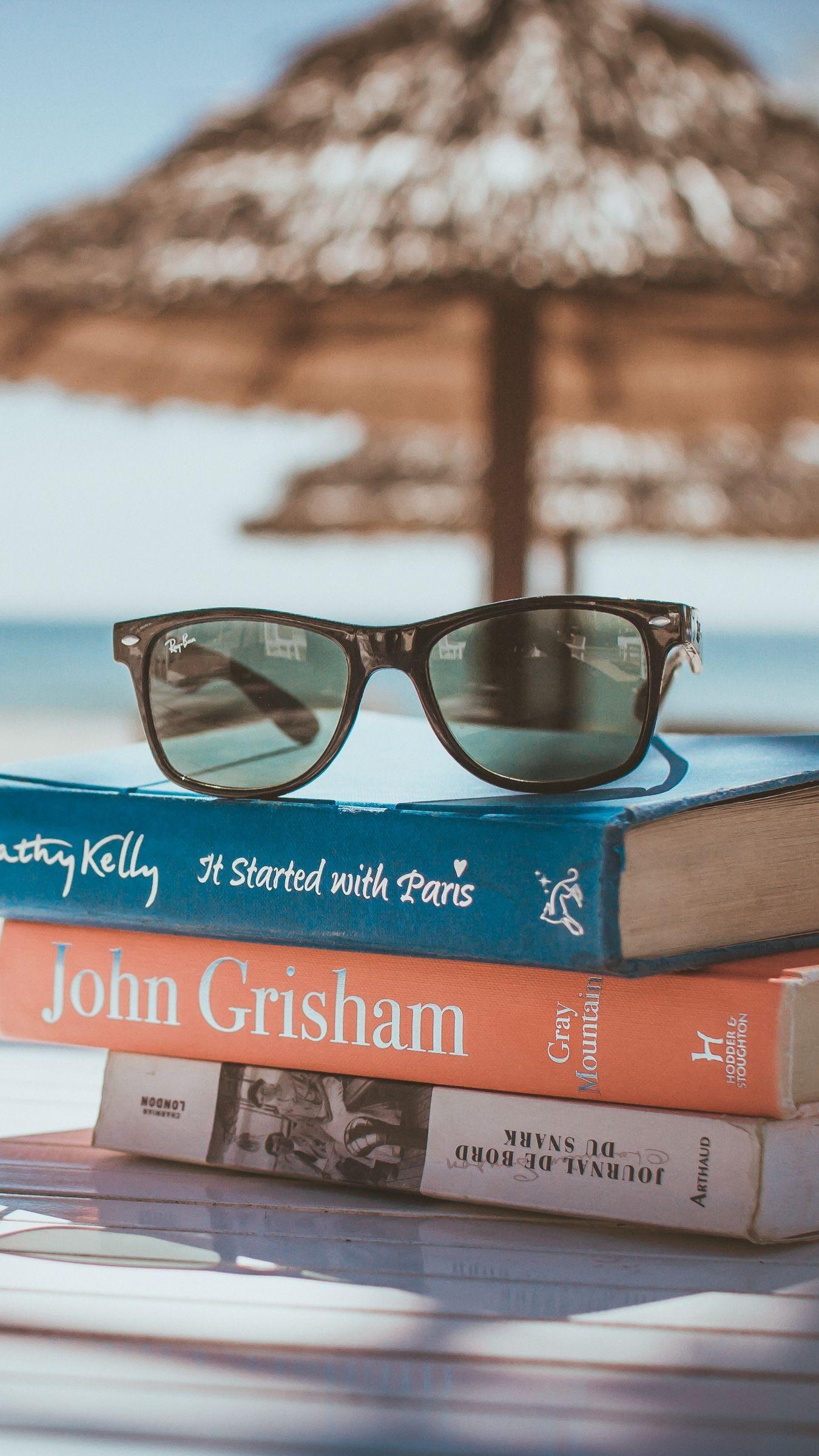 1350x2400 Download wallpaper 1350x2400 sunglasses, books, beach, sun iphone 8+/7+/6s+/for parallax HD background