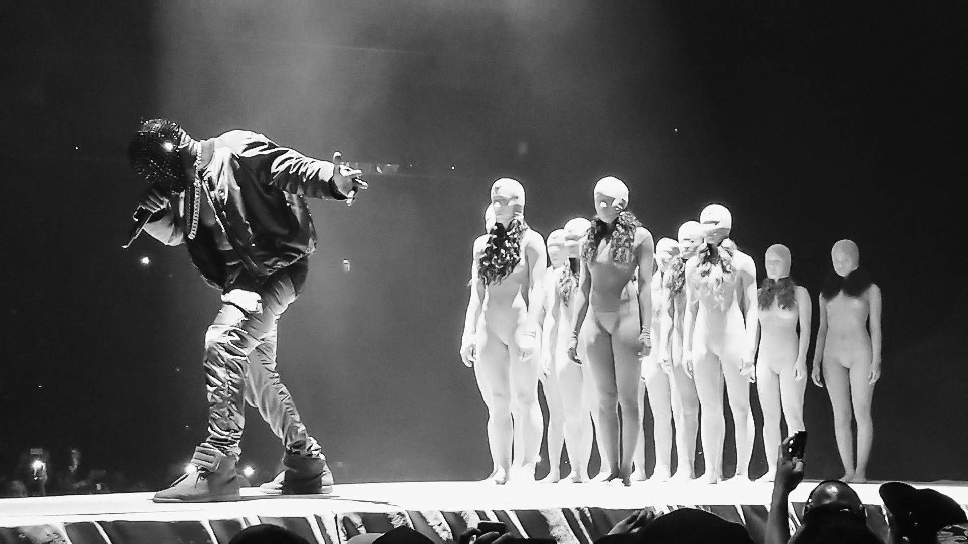 1920x1080 Kanye West Rapping On Stage Wallpaper