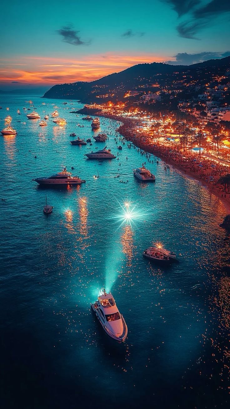 736x1308 Ibiza Nightlife Vibes Wallpaper. Vibrant Beach Party Scene for Mobile 4K Quality