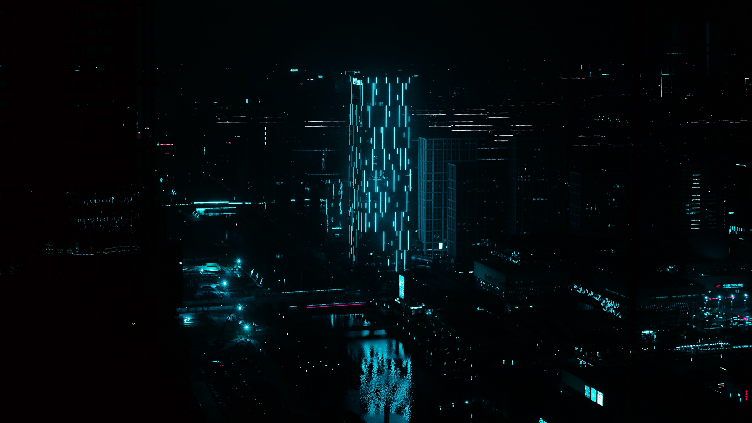 2560x1440 Night city building blue neon illumination Wallpaper 4K for Desktop
