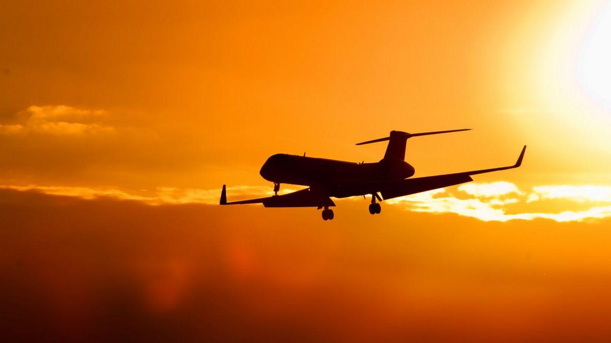 1244x700 Sunset Clouds Sun Aircraft Aviation Sillhouette CRJ 700 Bombardier Wallpaperx1080