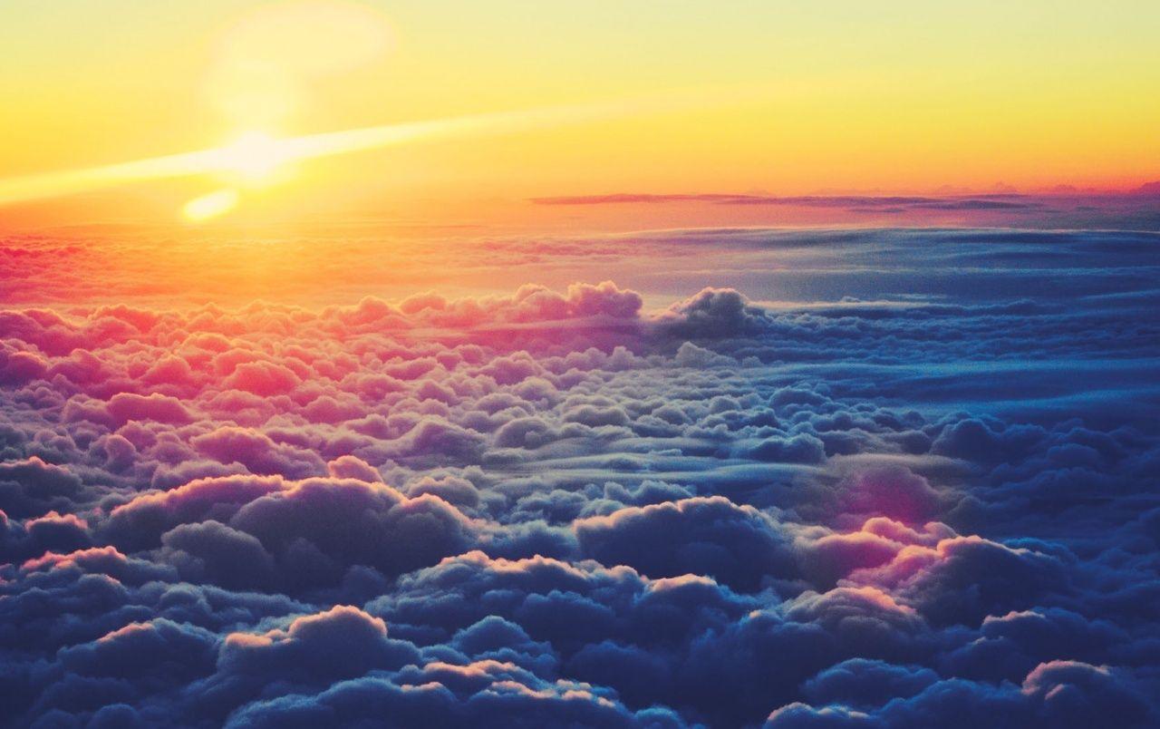 1280x804 Sunrise Above Fluffy Clouds wallpaper. Sunrise Above Fluffy Clouds