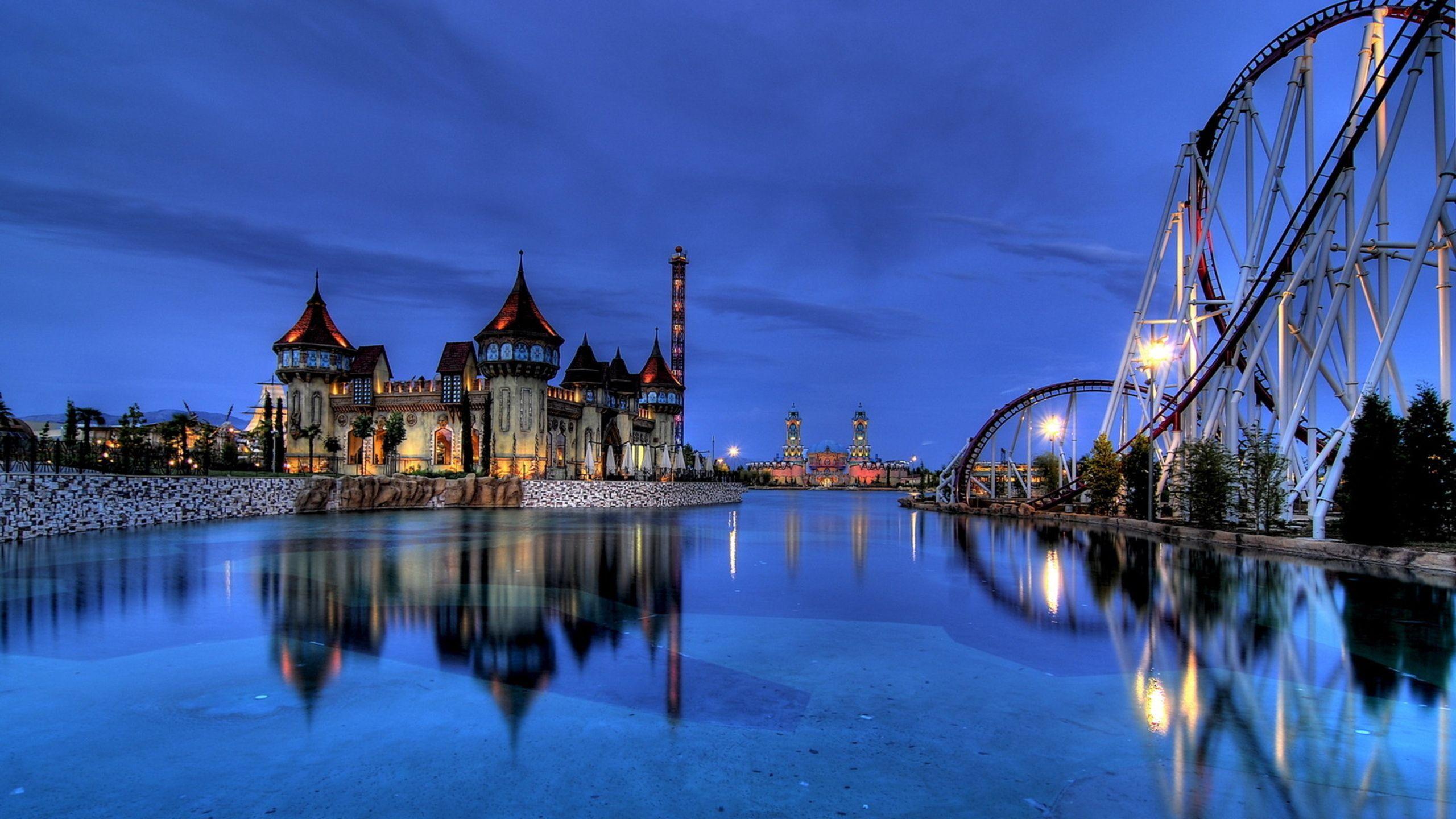 2560x1440 Download wallpaper 2560x1440 building, roller coaster, ice skating, fabulous widescreen 16:9 HD background