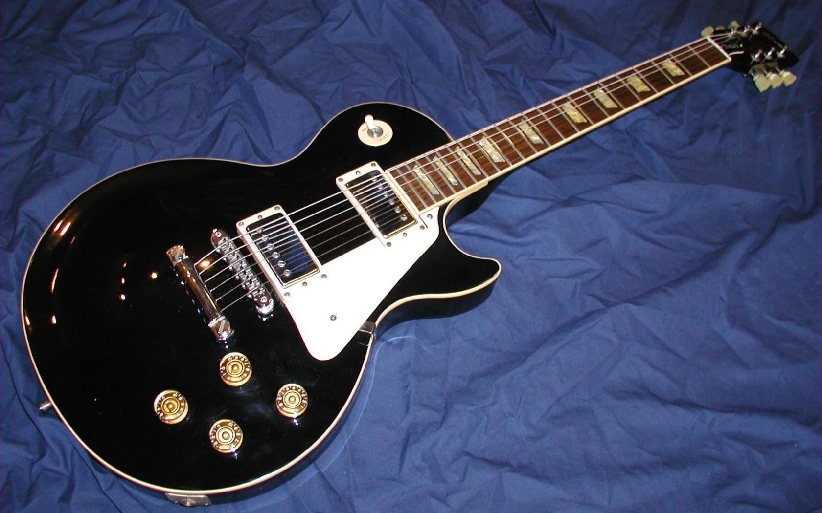 1680x1050 electric guitar wallpaper blue background the string wallpaper 1628 - Electric Guitars Wallpaper