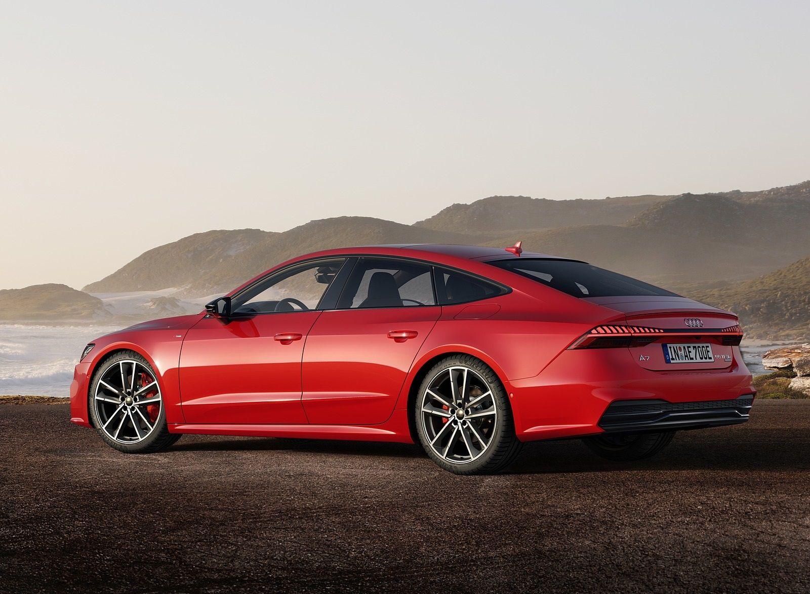 1600x1174 Audi A7 Sportback 55 TFSI E Quattro (Plug In Hybrid Color: Tango Red) Rear Three Quarter Wallpaper (70)