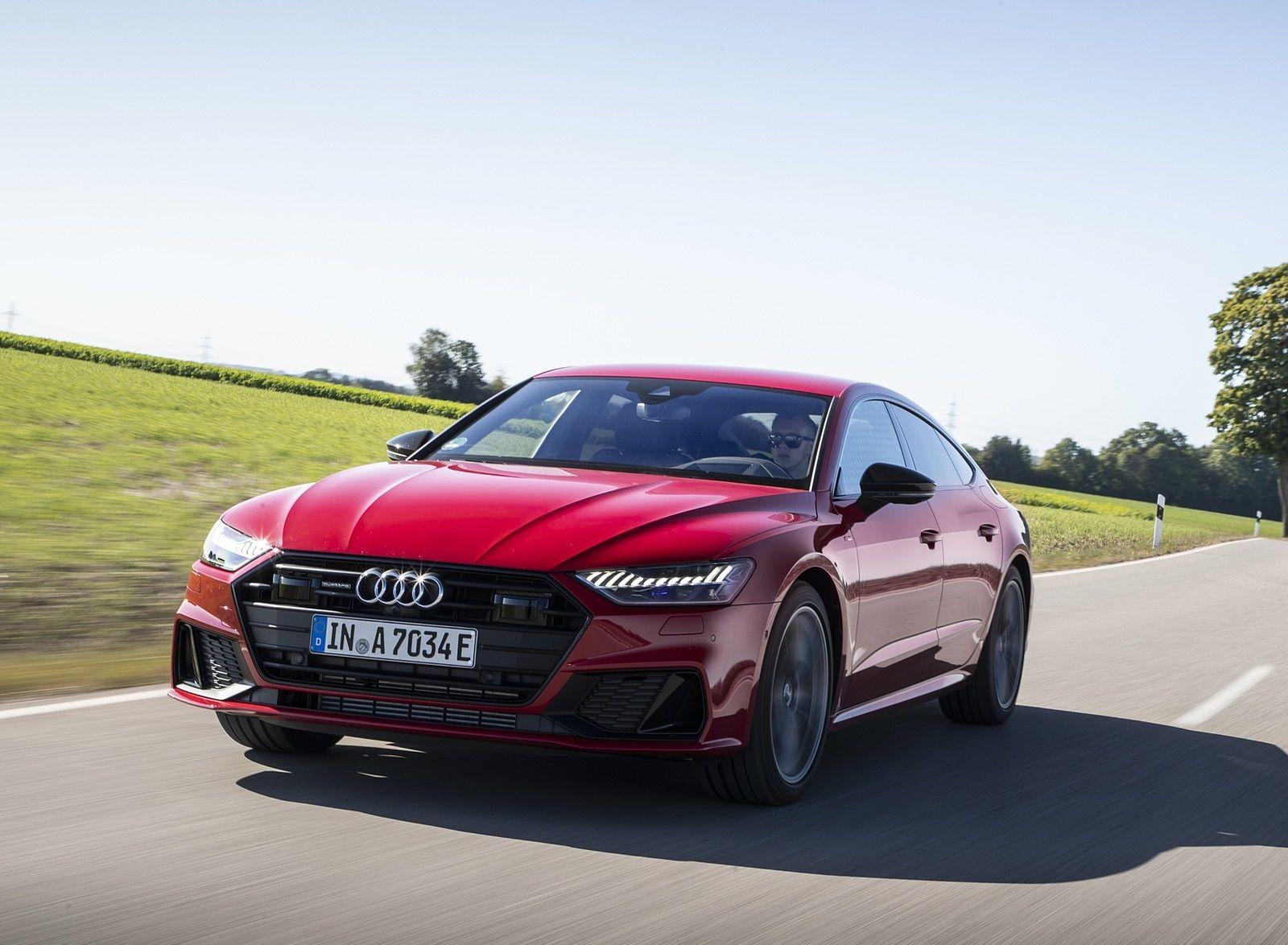 1600x1174 Audi A7 Sportback 55 TFSI E Quattro Plug In Hybrid (Color: Tango Red) Front Three Quarter Wallpaper (1)